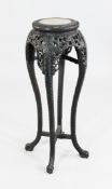 An early 20th century Chinese jardiniere stand An early 20th century Chinese carved rosewood