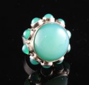 A Georg Jensen sterling silver and green chalcedony cabochon set dress ring, designed by Astrid Fog,