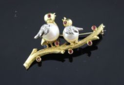 An 18ct gold, diamond, ruby and cultured pear set brooch, modelled as two birds on a branch, 1.