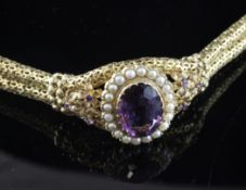 A Victorian style pierced 9ct gold, amethyst and seed pearl set double strand bracelet, A