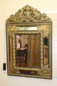 A Napoleon III ebonised and brass mounted mirror, W.3ft 7in. A Napoleon III ebonised and brass