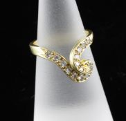 A gold and diamond dress ring stamped "Grima", size K. A gold and diamond dress ring stamped "