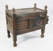 A carved Indian chest with single sliding panel door, W.3ft 7in. A carved Indian chest with single