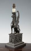 A late 19th century bronze gryphon table lamp, 17in. A late 19th century bronze gryphon table