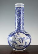 A Chinese underglaze blue and copper red bottle vase, early 19th century, 18.25in. (46cm), damaged A