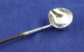 A George II silver toddy ladle, with engraved armorial and turned wooden handle, George Campar,