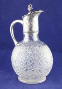 A Victorian silver mounted hobnail cut glass claret jug, of ovoid form, the collar with chased