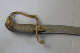 A 19th century French cavalry sabre, with 29 inch curved blade and brass horses head pommel and wire