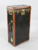A Malles Goyard printed canvas and leather bound wardrobe trunk, with brass fittings and internal