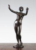 Eugene Schlipf German (1869-1943). A patinated bronze figure of a nude woman, on a circular base,