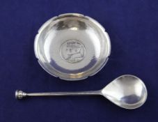 A cased 1930`s Arts & Crafts silver spoon, by Reynell Oswald Huyshe, London, 1935, 5.75in,