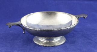 A George V silver quaich, with beaded borders, lug handles and curved supports, Barker Brothers,