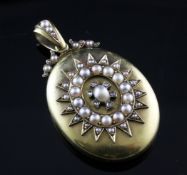 A Victorian gold, split pearl and diamond set pendant locket, of oval form, 1.75in.