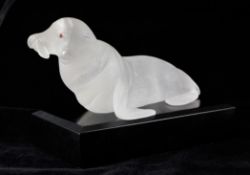 A 1960`s rock crystal carving of a sea lion, with red stone inset eyes, with inclusions to the