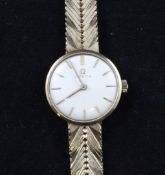 A lady`s early 1960`s 9ct gold Omega manual wind wrist watch, with baton numerals, c.620, on a