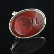 A Victorian 15ct gold and carnelian set fob seal, with pierced tapering stem and carved matrix