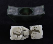 A Chinese pale celadon jade two piece belt buckle and a green soapstone match stand, the belt buckle