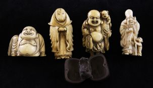 Four Japanese ivory netsuke and a nut netsuke, 19th / early 20th century, the first carved as a