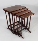 An Edwardian nest of mahogany quartetto tables, largest 1ft 10in.