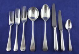 A matched part canteen of 1930`s and later silver rat tail and hanoverian pattern cutlery,