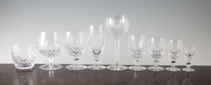 A suite of Waterford Kilcash pattern cut crystal drinking glasses, together with a matching decanter
