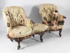 A Victorian rosewood double conversation settee, each end with a button back revolving tub shaped