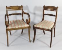 A set of eight Regency mahogany dining chairs, with palmette carved backs and ropetwist spars,
