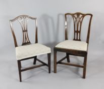 A set of three 18th century country Chippendale mahogany dining chairs, with drop in seats, together