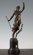 A French Art Nouveau patinated bronze figure of Diana, modelled beside bulrushes, on circular marble