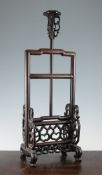 A Chinese rosewood adjustable lamp stand, Dengtai, late 19th century, the rectangular frame with