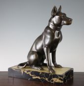 A French Art Deco model of a dog, on a yellow onyx and veined black marble rectangular base, 13in.