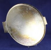 A 1930`s Georg Jensen sterling silver circular two handled tea tray, designed by Johan Rohde, no.