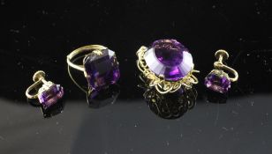 A modern suite of 14ct gold and amethyst jewellery, comprising pendant brooch, pair of ear clips and