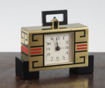 A modern Cartier enamelled gilt brass carriage alarm timepiece, with arabic dial and cabochon set