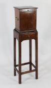 A George III mahogany and chequer chevron banded apothecary cabinet on stand, with cupboard door