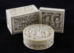 Three Chinese export ivory boxes, 19th century, all carved in high relief with figures amid trees