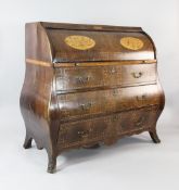 An 18th century Dutch marquetry inlaid and chequer banded cylinder bureau, with three bombe shaped