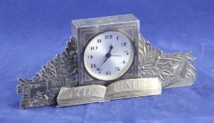 A 1970`s "The Times" silver mounted desk timepiece, of square form with Arabic dial and flanked by