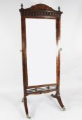 A 19th century mahogany cheval mirror, with flaming urn finials, pendant drop frieze, downswept
