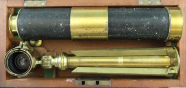 A 19th century lacquered brass travelling telescope and folding stand, in a mahogany case, 13in.