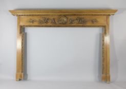 A stripped pine fire surround, with central shell and acanthus scroll leaf decoration, W.6ft 8in.