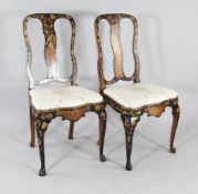 A pair of 19th century Dutch marquetry side chairs, inlaid with flowers and birds with a