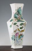 A Chinese famille rose hexagonal baluster vase, Republic period, painted with the figure of He