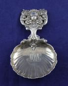 An ornate late 19th/early 20th century Tiffany & Co sterling silver spoon, with shaped fluted bowl
