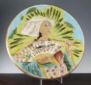 A large Continental Aesthetic period majolica dish, late 19th century, decorated with an oriental