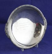 A 1930`s silver bowl with golf related inscription, with foliate rim, Goldsmiths & Silversmiths Co
