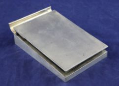 A 1960`s engine turned silver mounted desk pad, by Asprey & Co Ltd, of rectangular form, with