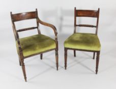 A set of eight Regency mahogany dining chairs two with arms, five singles, with ropetwist spars,