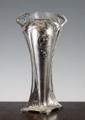 A WMF Art Nouveau pewter two handled vase, with engraved glass liner and stylised floral decoration,