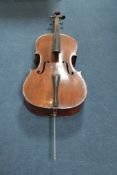 A 19th century German cello, two piece mahogany back, the headstock with stamped no`s. 232, 30in.